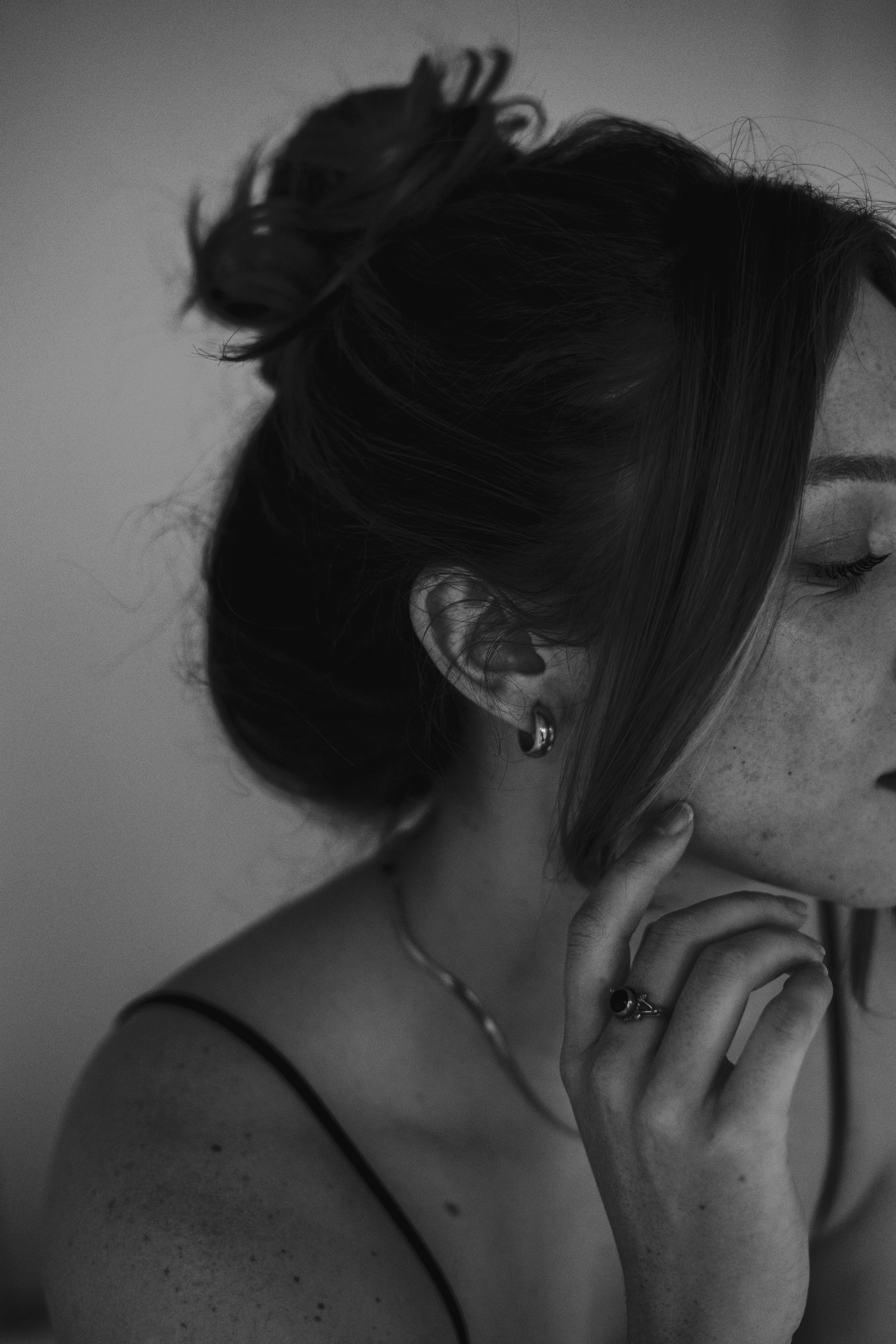 woman with silver hoop earrings